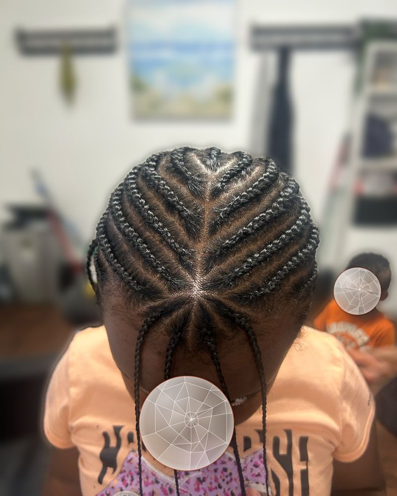 Child's center-part cornrows flowing into long thin braids