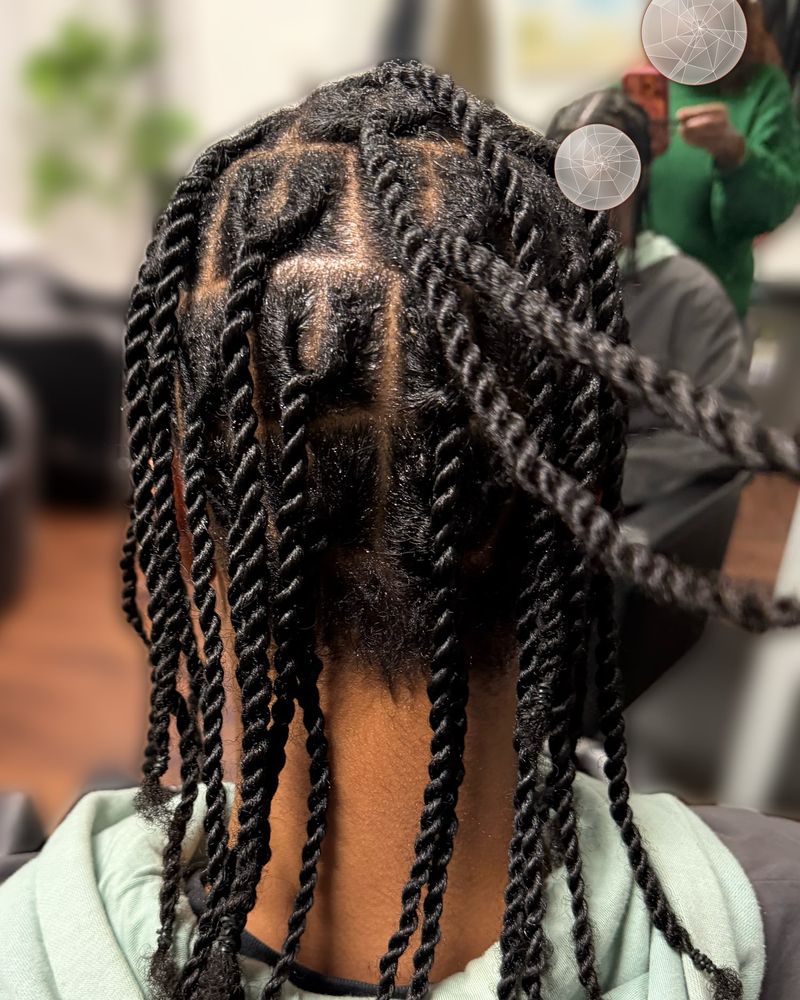 Men's two-strand twists on box parts, seen from behind