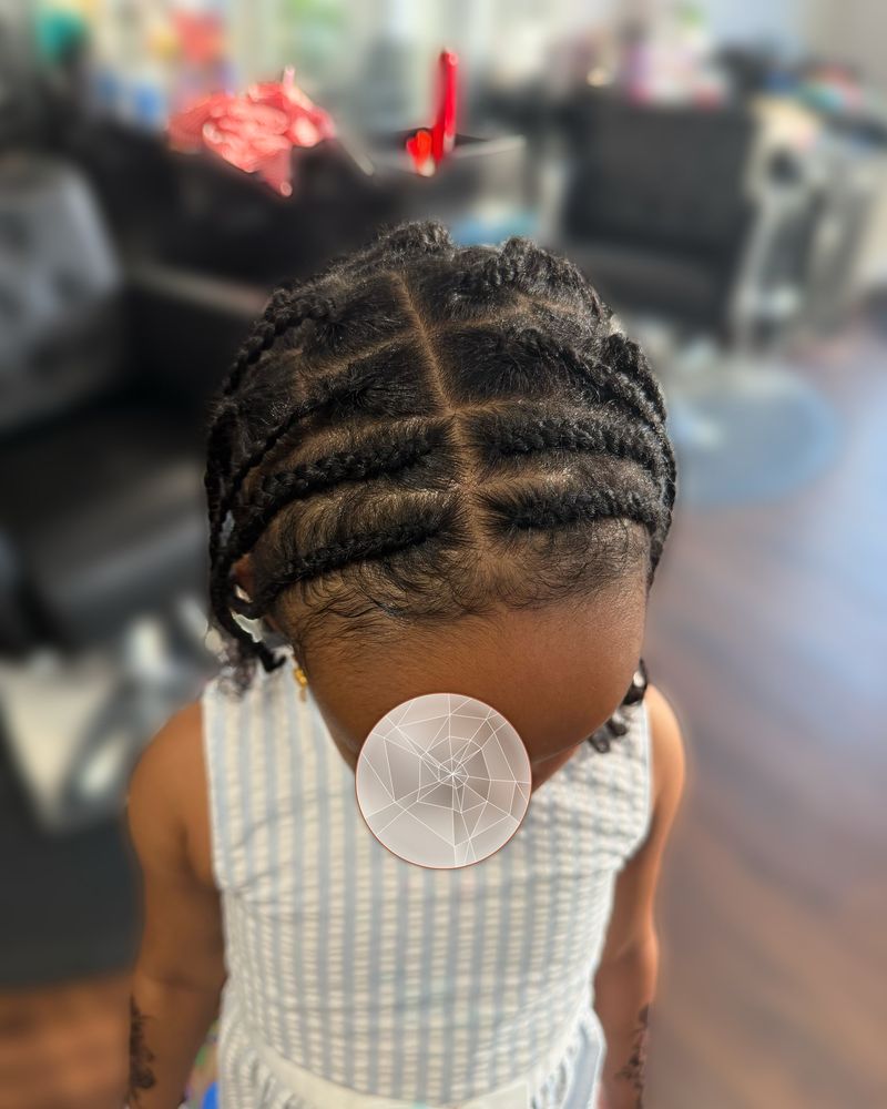 Child's criss-cross parted cornrows, seen from above