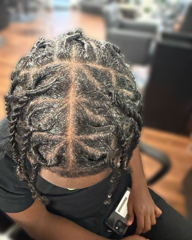 Men's two-strand twists on box parts, seen from behind