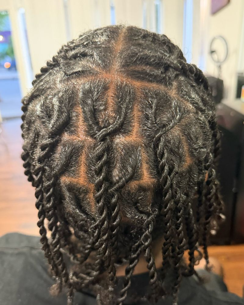 Men's two-strand twists on box parts, seen from behind