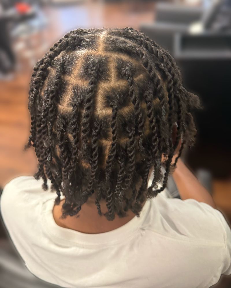Men's two-strand twists on box parts, seen from behind