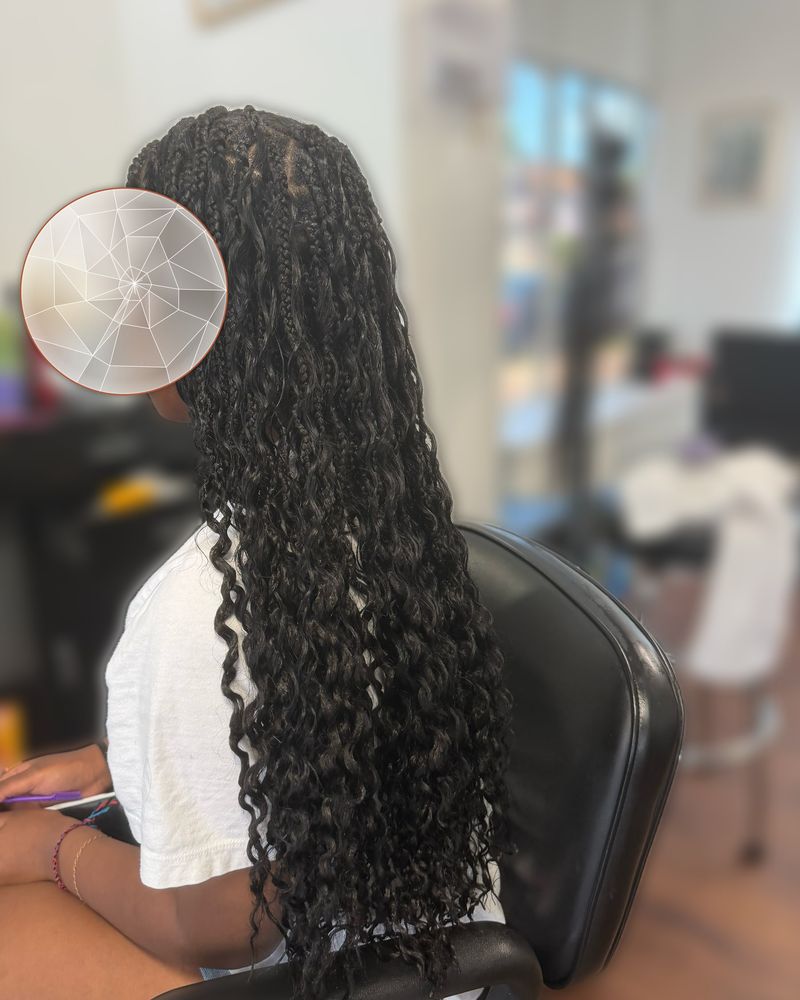 Boho knotless braids on triangle parts with curly ends, side view