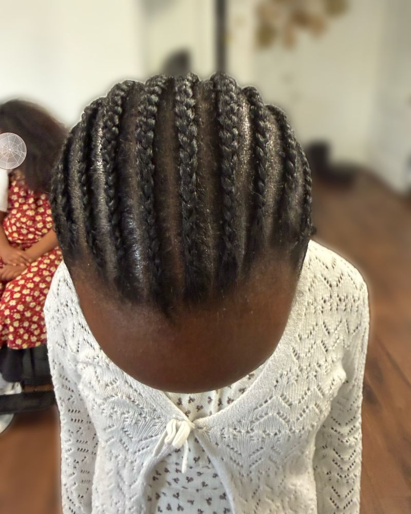 Child's chunky straight-back cornrows, seen from above